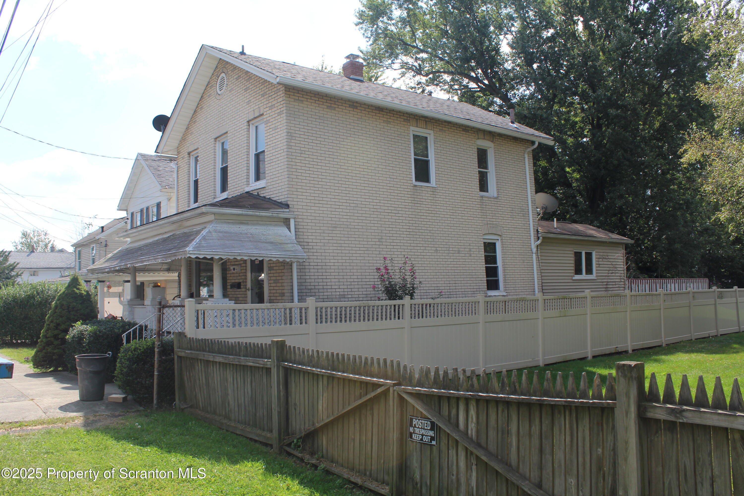 1919 Price Street Scranton, PA 18504 - Photo 39 of 44 a view of a house with wooden deck and backyard