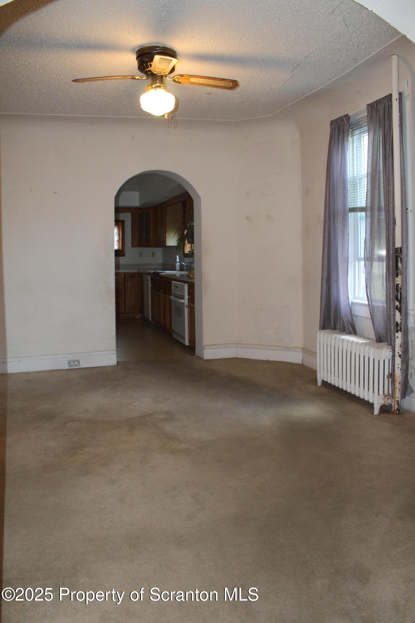 1919 Price Street Scranton, PA 18504 - Photo 5 of 44 a view of a livingroom with a projector