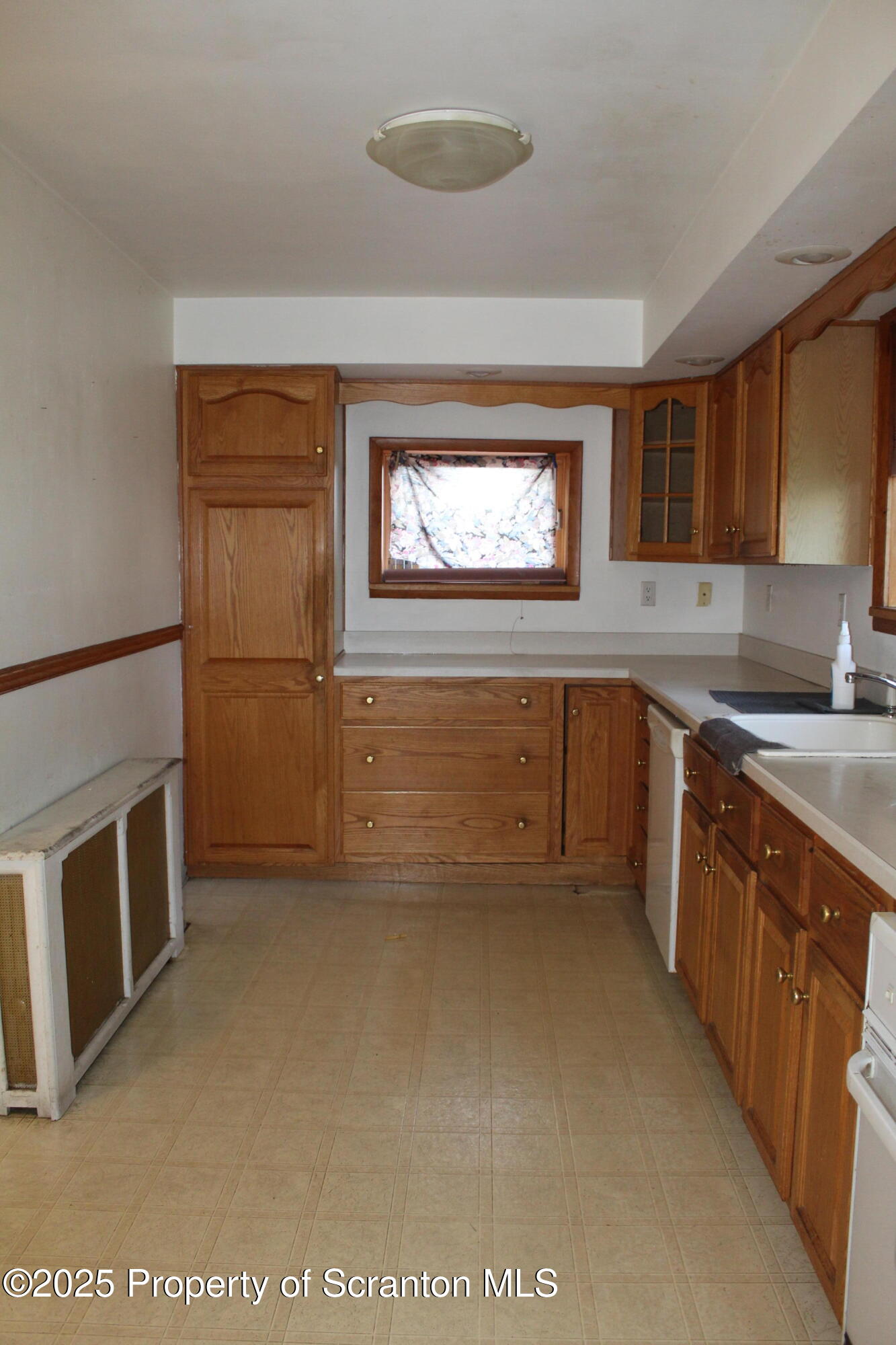 1919 Price Street Scranton, PA 18504 - Photo 9 of 44 a kitchen with stainless steel appliances granite countertop a stove a sink and a microwave