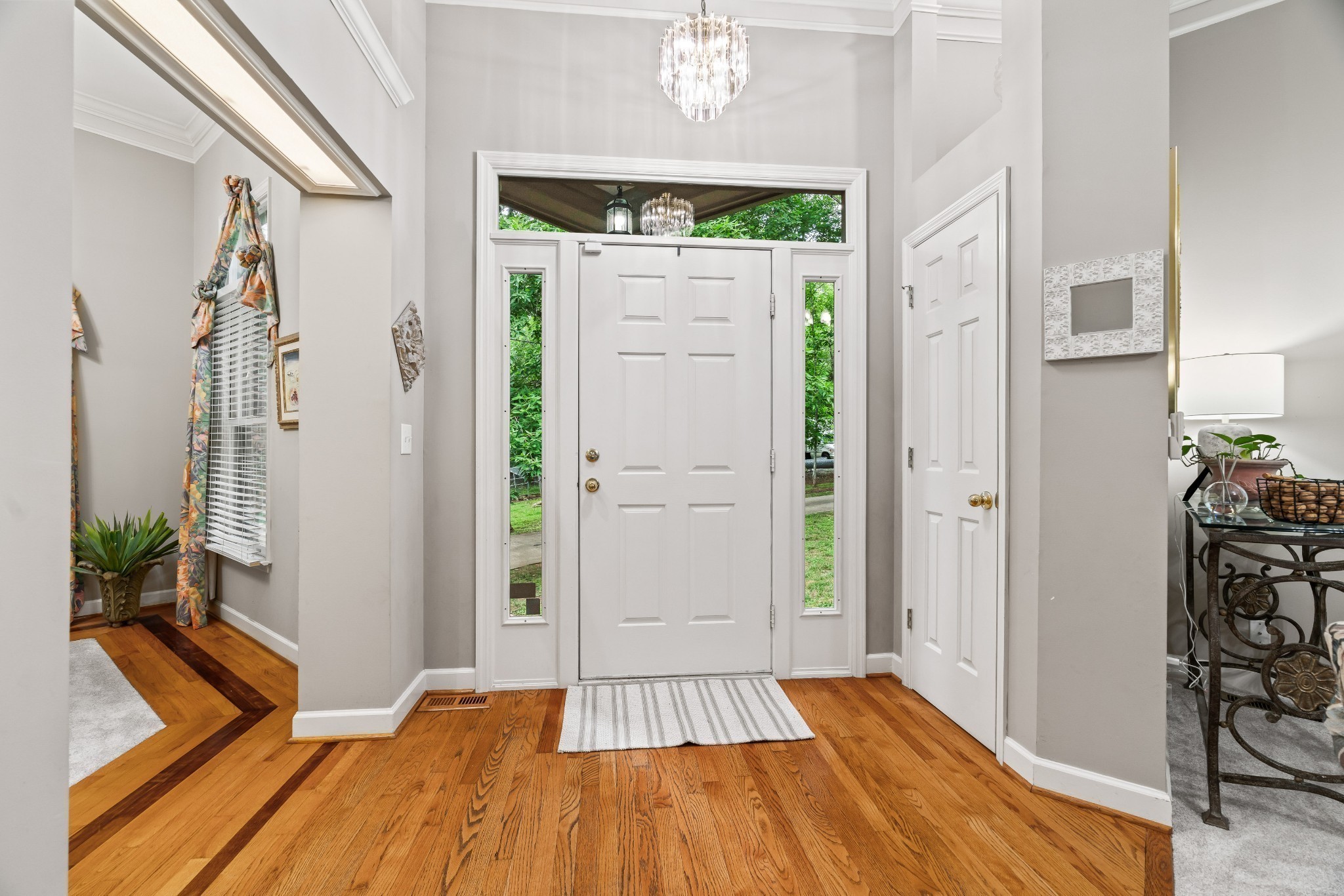 5544 South New Hope Road Hermitage, TN 37076 - Photo 9 of 62 a view of a hallway view with wooden floor and staircase
