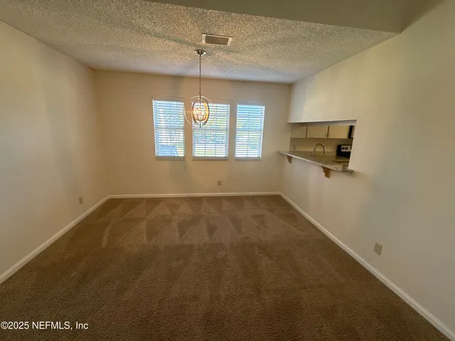 en empty room with windows