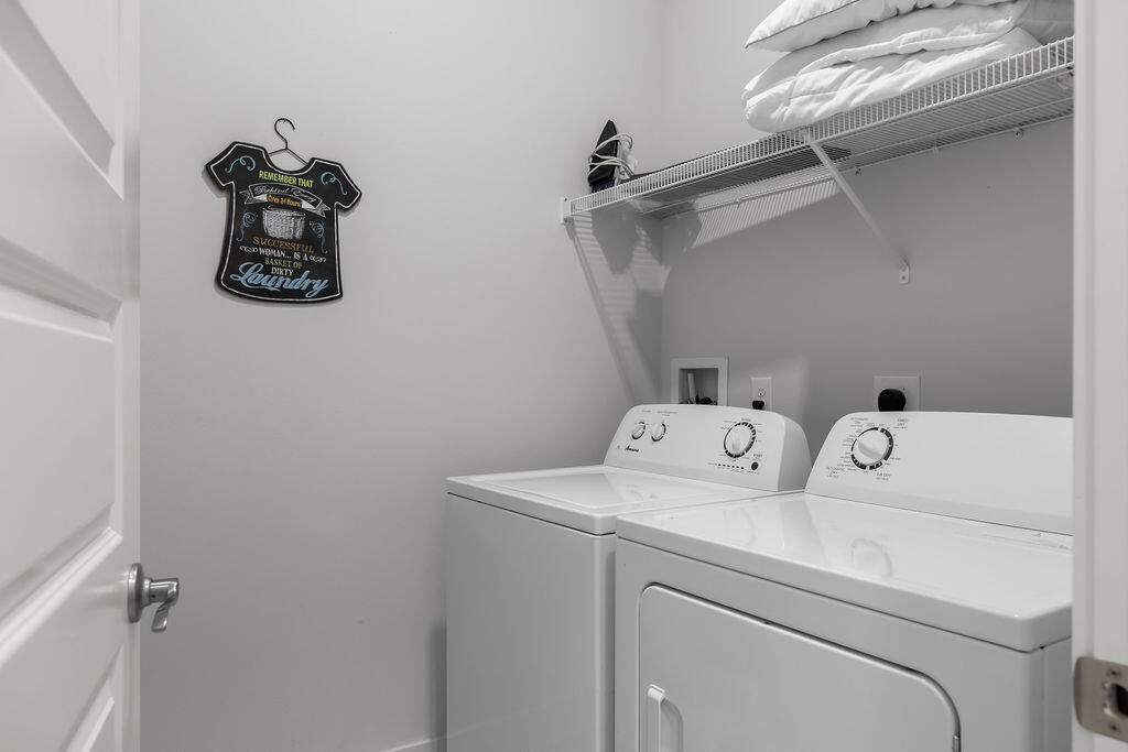 10 York Ln Inlet Beach, Unit B Inlet Beach, FL 32461 - Photo 17 of 46 a utility room with dryer and washer