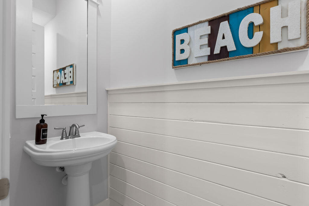 10 York Ln Inlet Beach, Unit B Inlet Beach, FL 32461 - Photo 18 of 46 a bathroom with a sink and a toilet