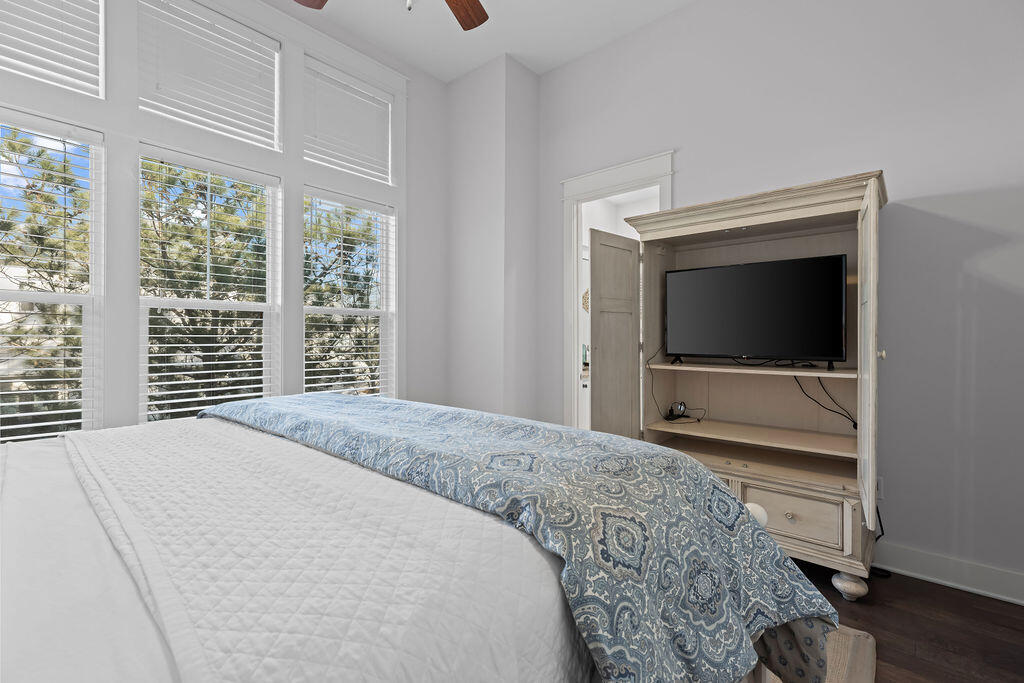 10 York Ln Inlet Beach, Unit B Inlet Beach, FL 32461 - Photo 23 of 46 a bedroom with a bed and a television
