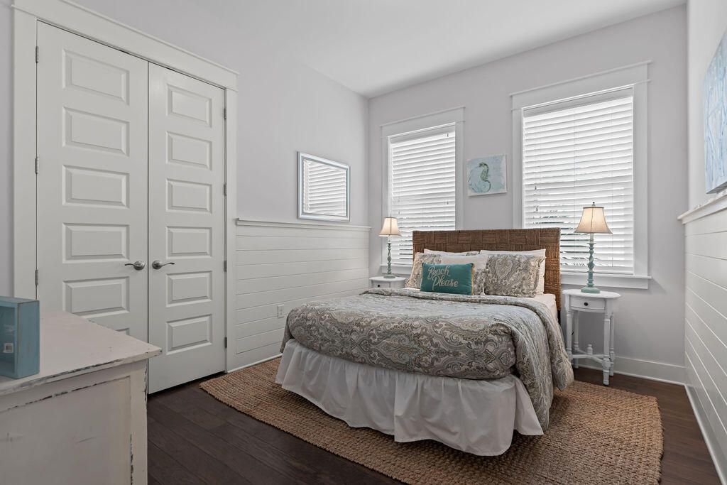 10 York Ln Inlet Beach, Unit B Inlet Beach, FL 32461 - Photo 30 of 46 a bedroom with a bed and cabinet