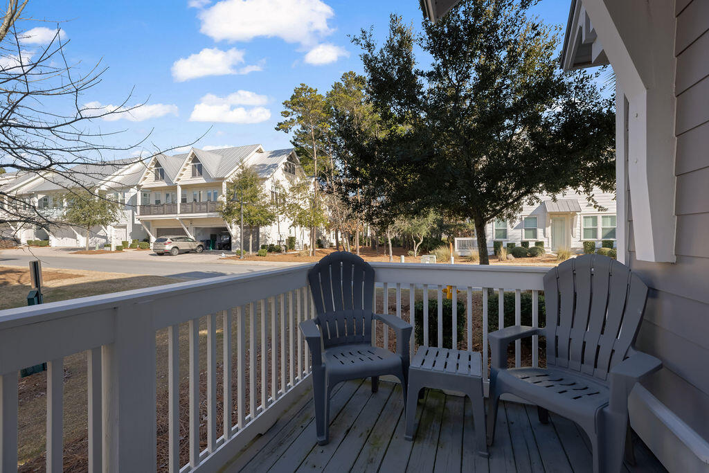 10 York Ln Inlet Beach, Unit B Inlet Beach, FL 32461 - Photo 40 of 46 a view of a deck with furniture and a backyard