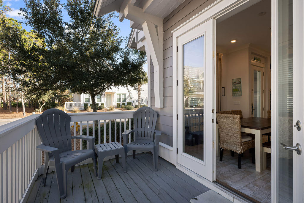 10 York Ln Inlet Beach, Unit B Inlet Beach, FL 32461 - Photo 41 of 46 a view of balcony with furniture and wooden deck