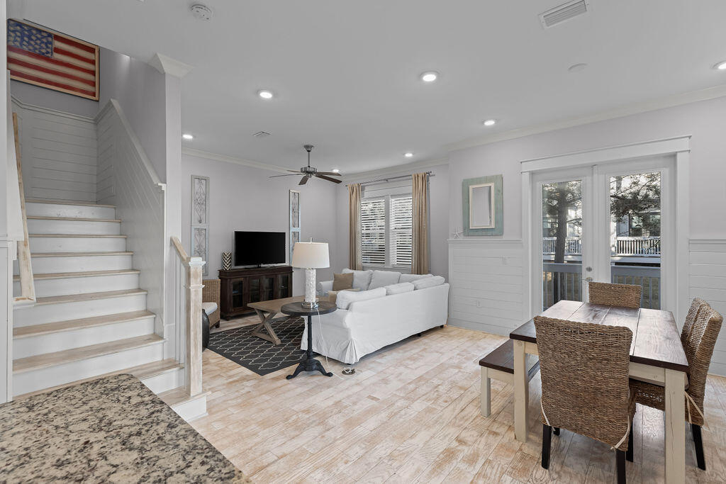 10 York Ln Inlet Beach, Unit B Inlet Beach, FL 32461 - Photo 9 of 46 a living room with furniture and a flat screen tv