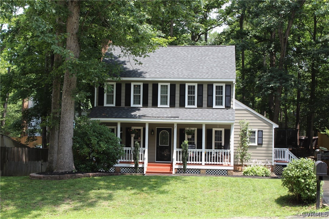 10718 Ridgerun Road Chesterfield, VA 23832 - Photo 3 of 50 a front view of a house with a yard and a large tree