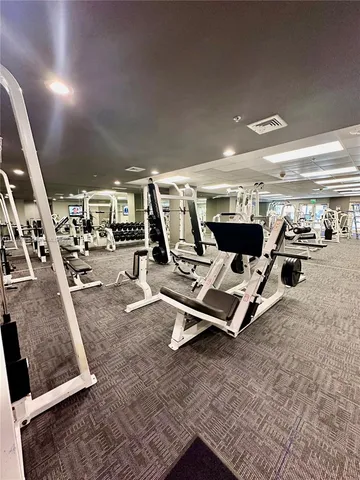 a view of a gym with equipment