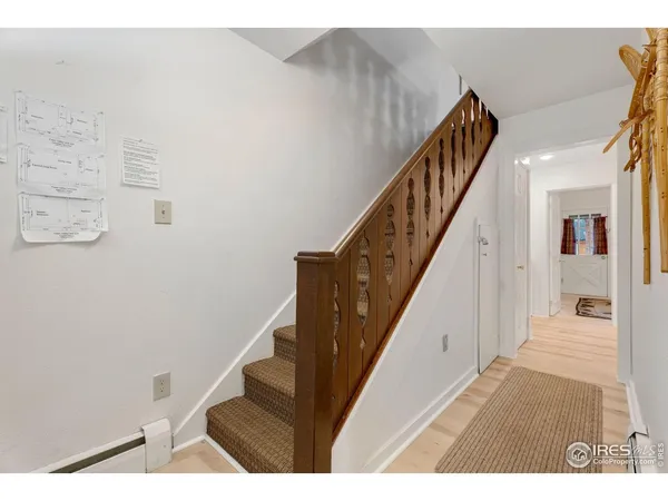 a view of balcony with wooden floor