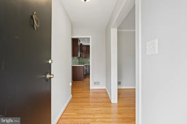 a view of a bathroom from the hallway