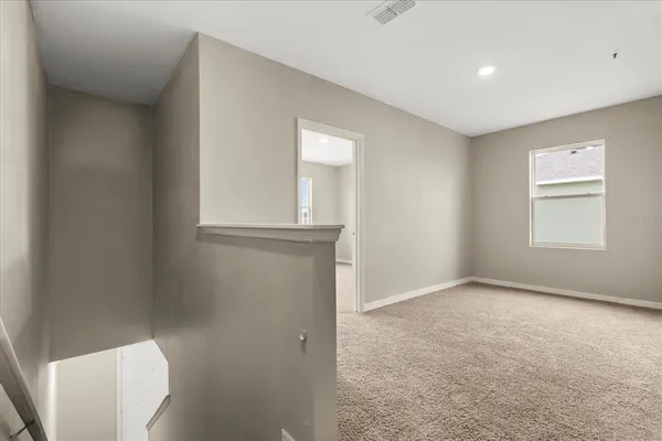 wooden floor and window in a room