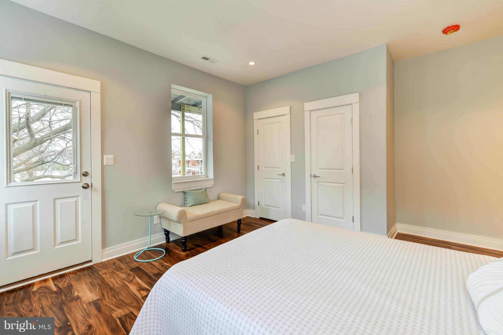 1717 Lincoln Road Northeast, Unit 2 Washington, DC 20002 - Photo 22 of 24 a bedroom with two beds and a window