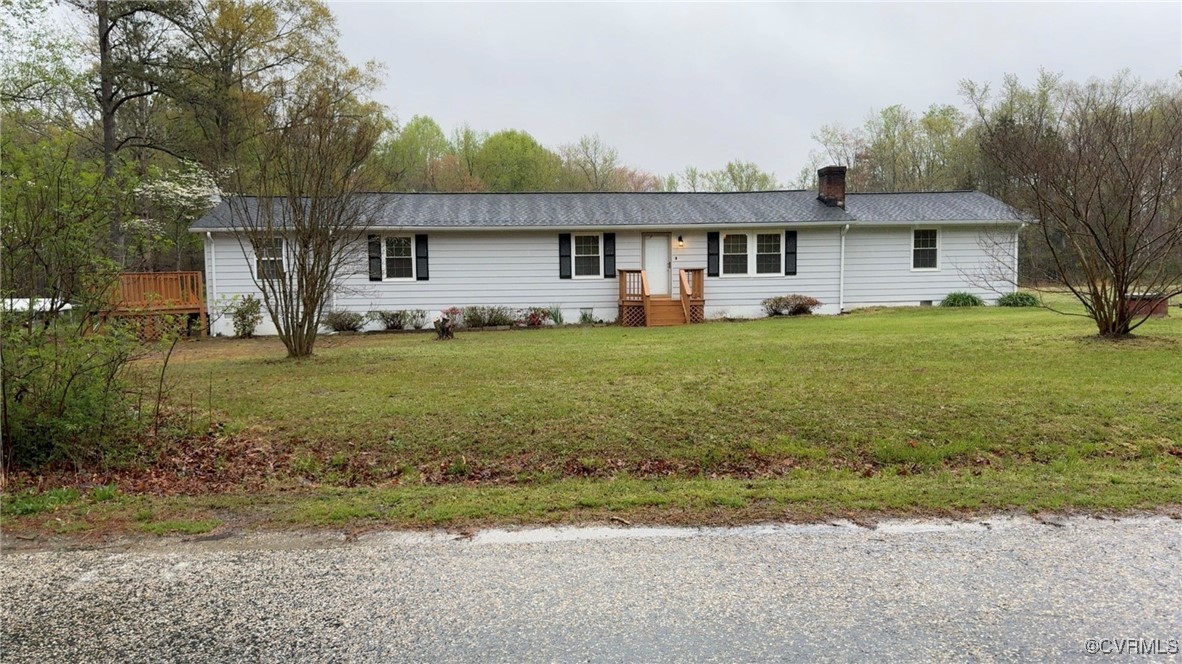932 Eastern View Road St. Stephens Church, VA 23148 - Photo 17 of 17 a front view of a house with garden
