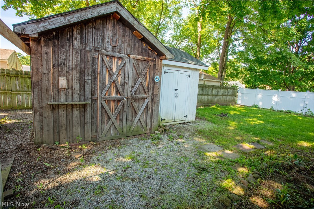 136 Stephens Road Akron, OH 44312 - Photo 21 of 22 2 storage sheds in fully fenced back yard