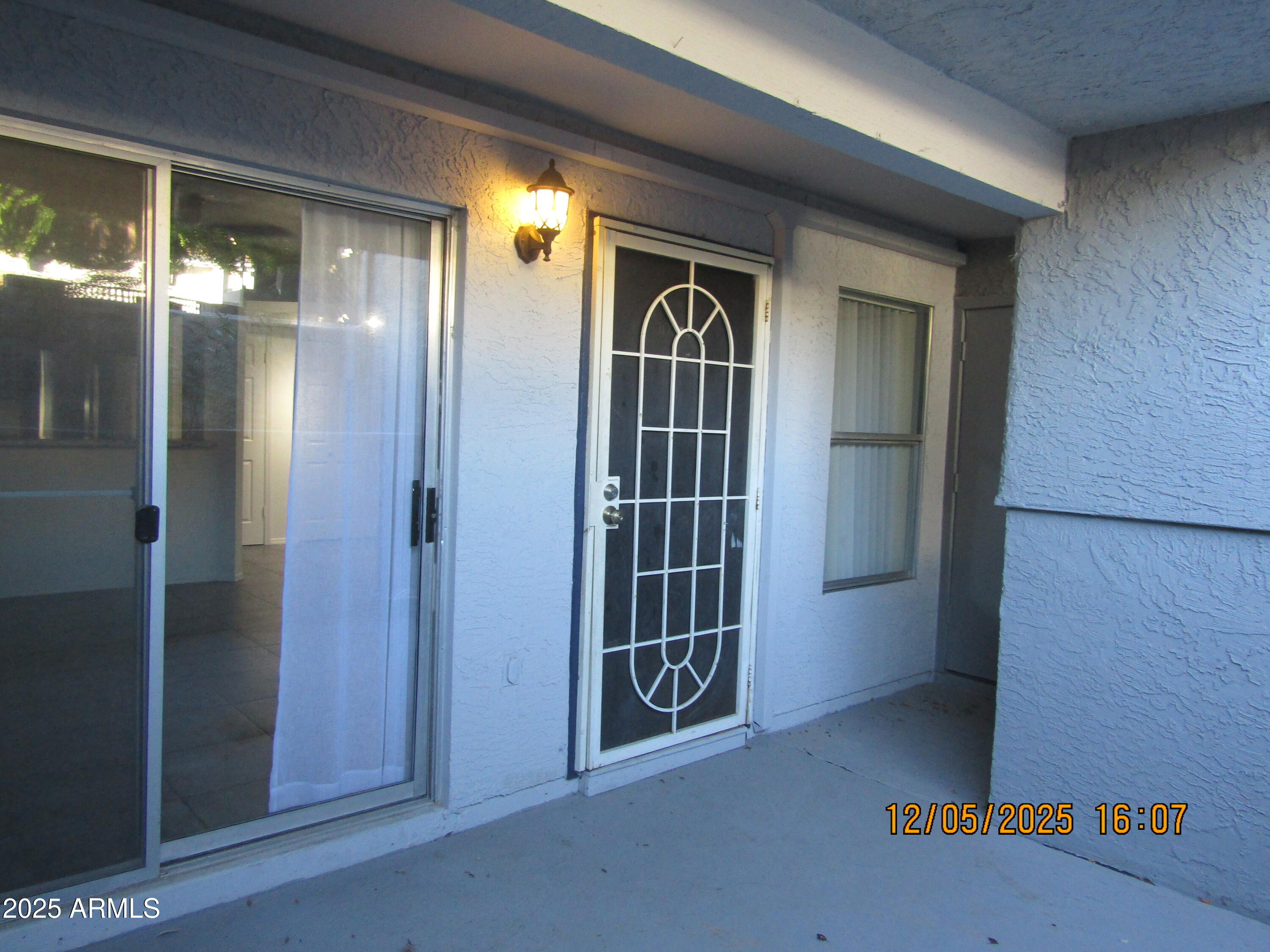 1331 West Baseline Road, Unit 102 Mesa, AZ 85202 - Photo 1 of 13 a view of front door of house