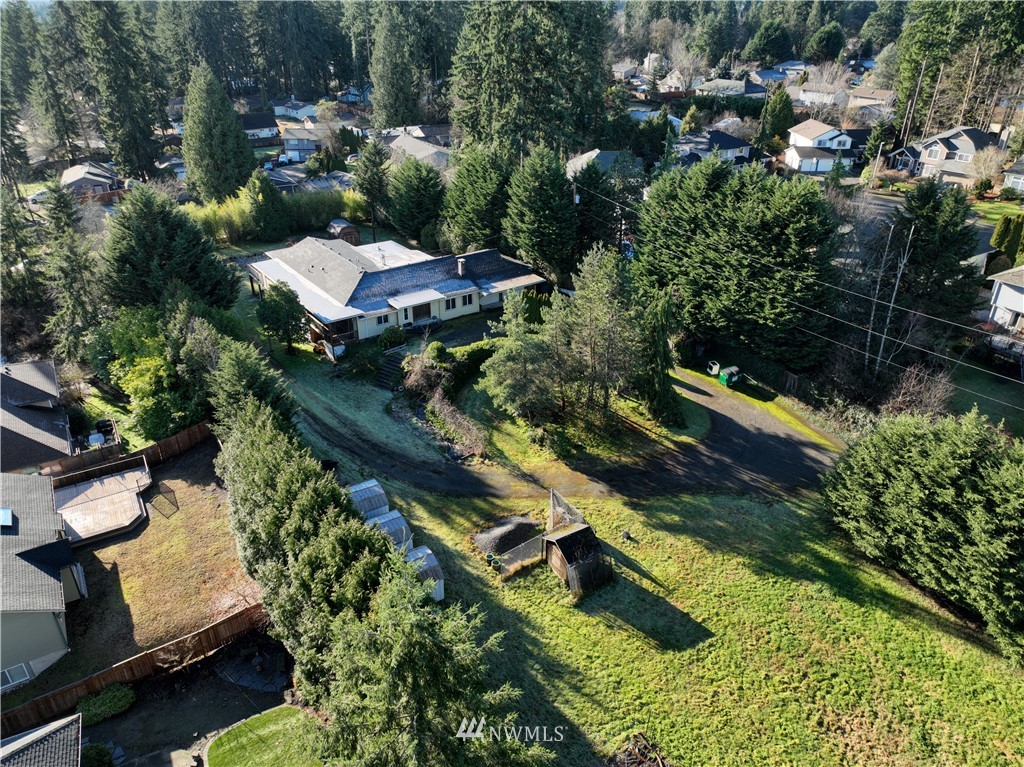 1000 Duchess Road Bothell, WA 98012 - Photo 1 of 35 an aerial view of residential house with outdoor space and swimming pool