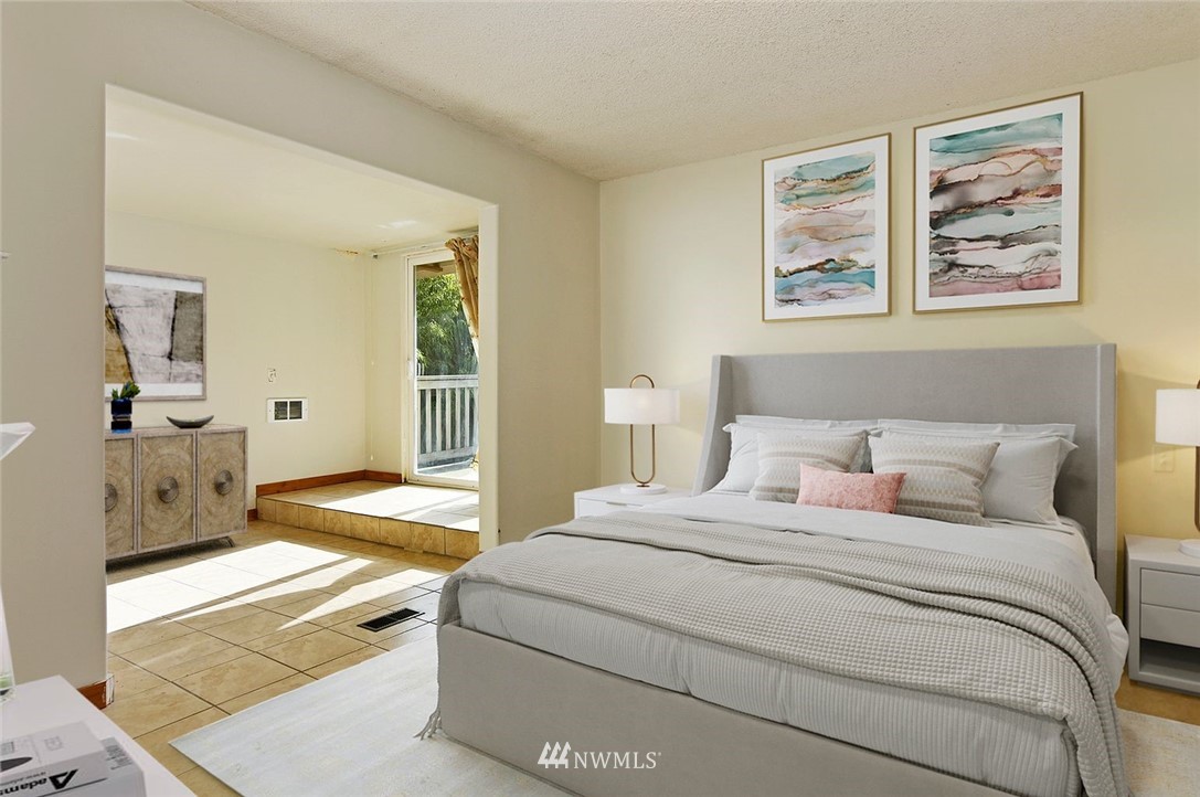 1000 Duchess Road Bothell, WA 98012 - Photo 17 of 35 a bedroom with a bed and a painting on the wall