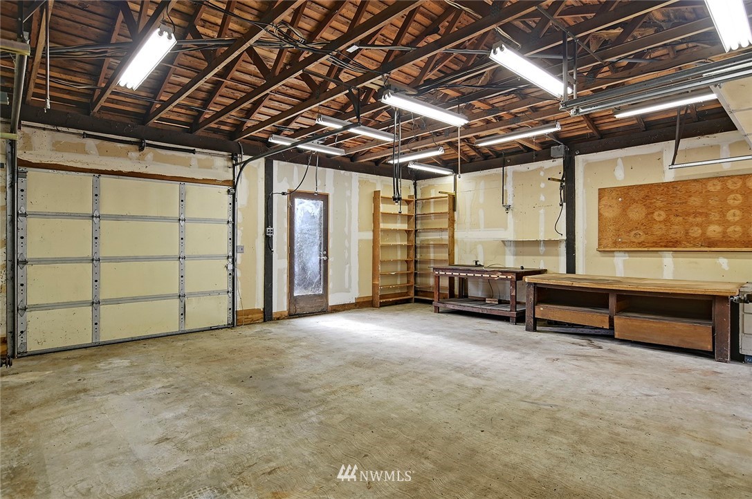 1000 Duchess Road Bothell, WA 98012 - Photo 18 of 35 a view of an empty room with a garage