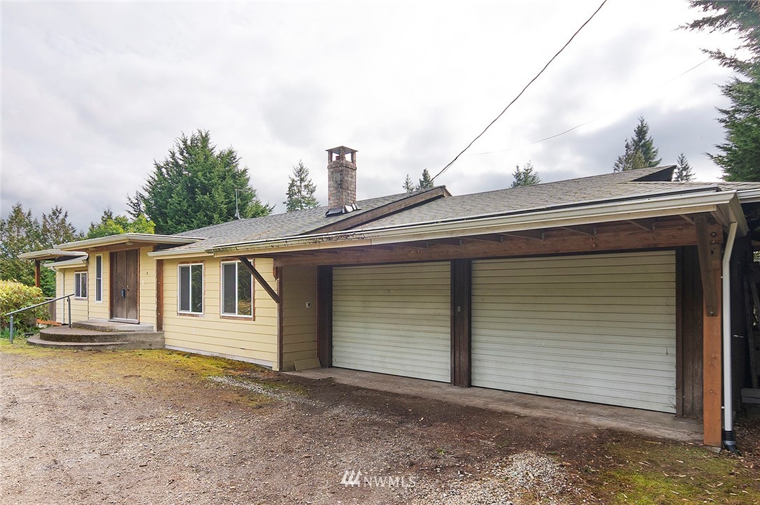 1000 Duchess Road Bothell, WA 98012 - Photo 3 of 35 a house with white door