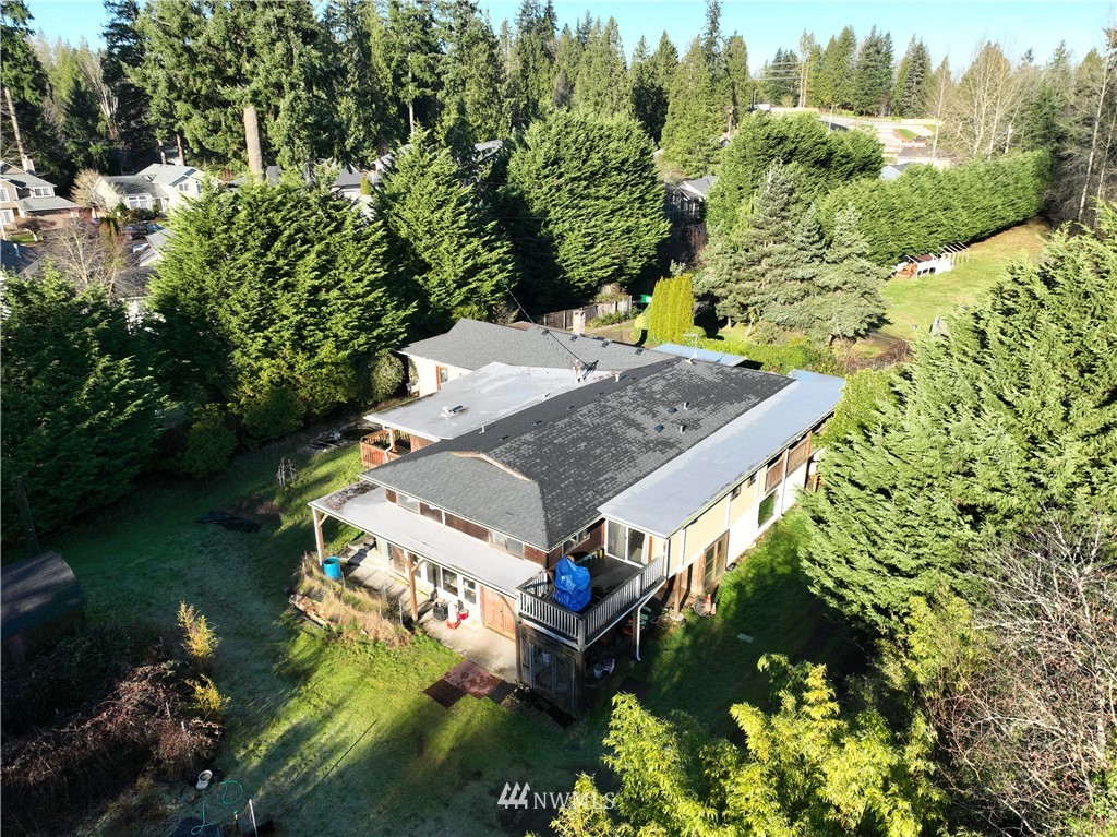 1000 Duchess Road Bothell, WA 98012 - Photo 4 of 35 an aerial view of a house with yard swimming pool and outdoor seating