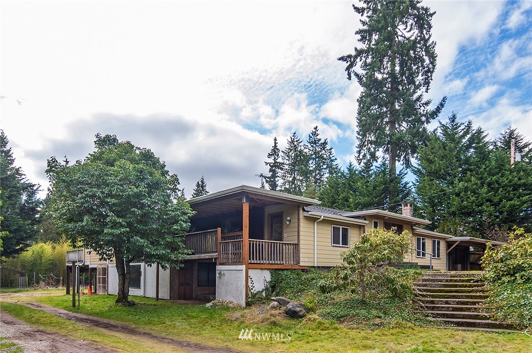 1000 Duchess Road Bothell, WA 98012 - Photo 5 of 35 a view of a house with a yard