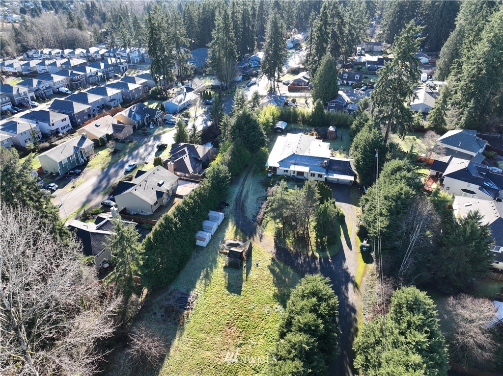 1000 Duchess Road Bothell, WA 98012 - Photo 7 of 35 an aerial view of residential houses with outdoor space