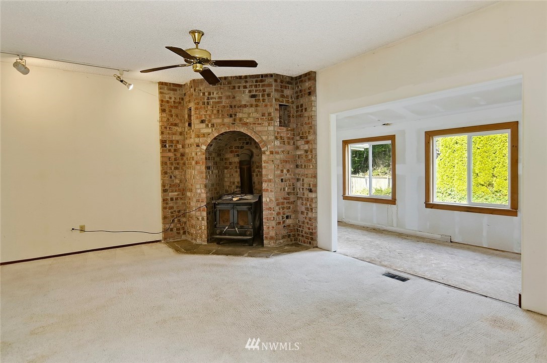 1000 Duchess Road Bothell, WA 98012 - Photo 10 of 35 a view of livingroom with furniture and chandelier fan