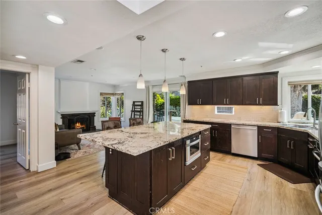 a large kitchen with a large island in it