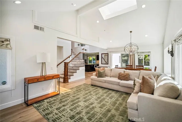 a living room with furniture and a rug