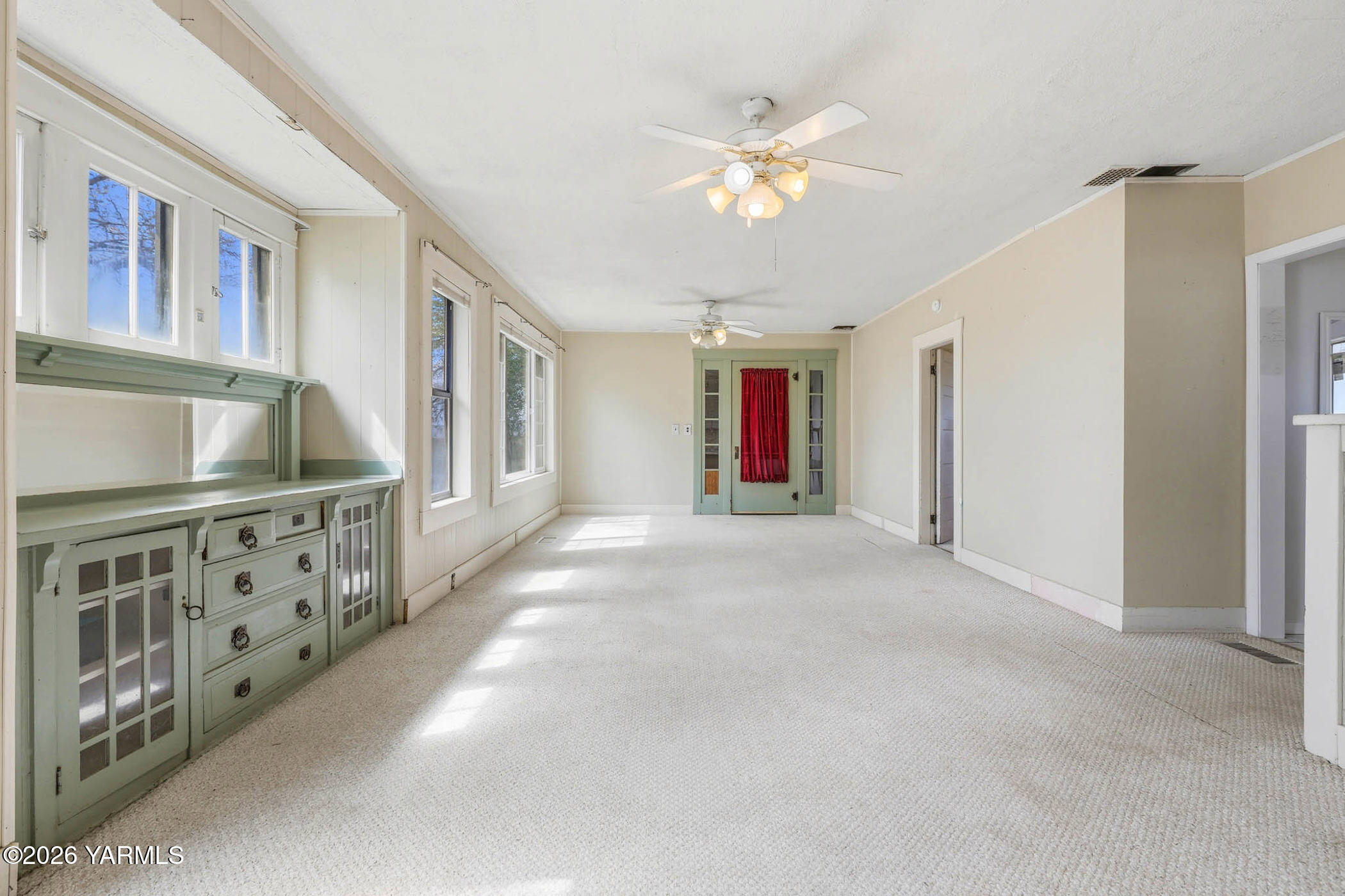 721 Blaine Road Granger, WA 98932 - Photo 17 of 45 a view of an empty room with chandelier fan