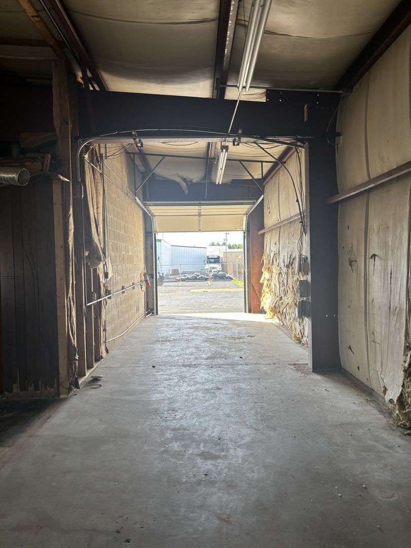354 Civic Road LaSalle, IL 61301 - Photo 17 of 19 a view of a hallway with wooden walls and windows