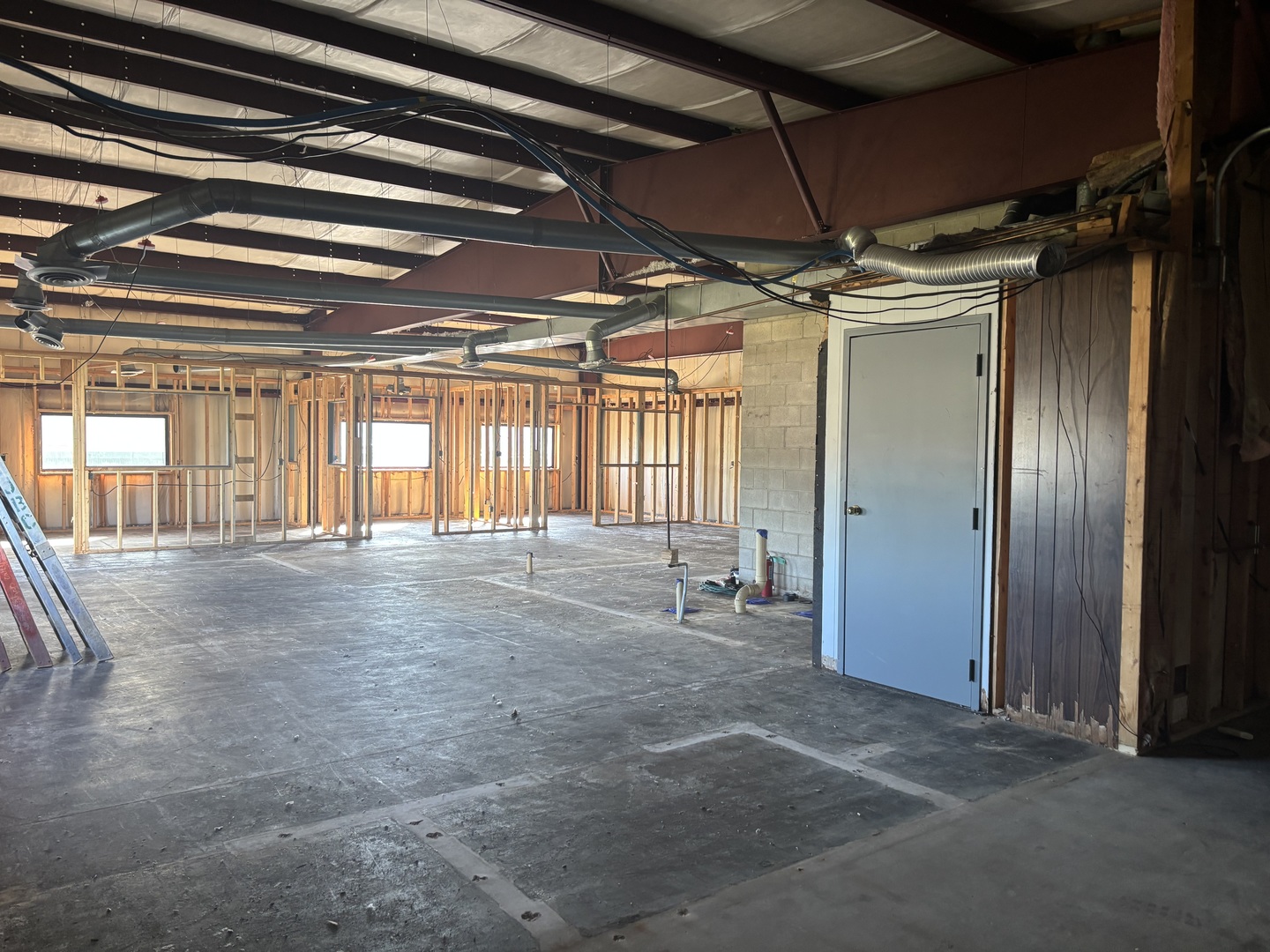 354 Civic Road LaSalle, IL 61301 - Photo 18 of 19 a view of an empty room with wooden floor and a window