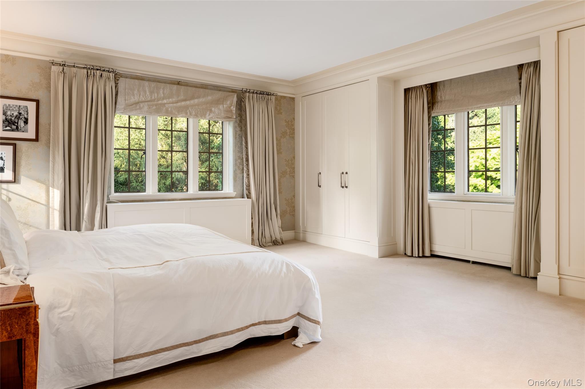 42 Masterton Road Bronxville, NY 10708 - Photo 19 of 36 a bedroom with a bed and a window