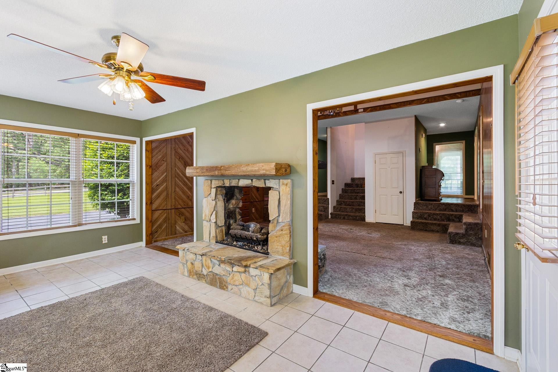 229 Creekfield Road Clinton, SC 29325 - Photo 3 of 23 Sunroom 1st floor with fireplace