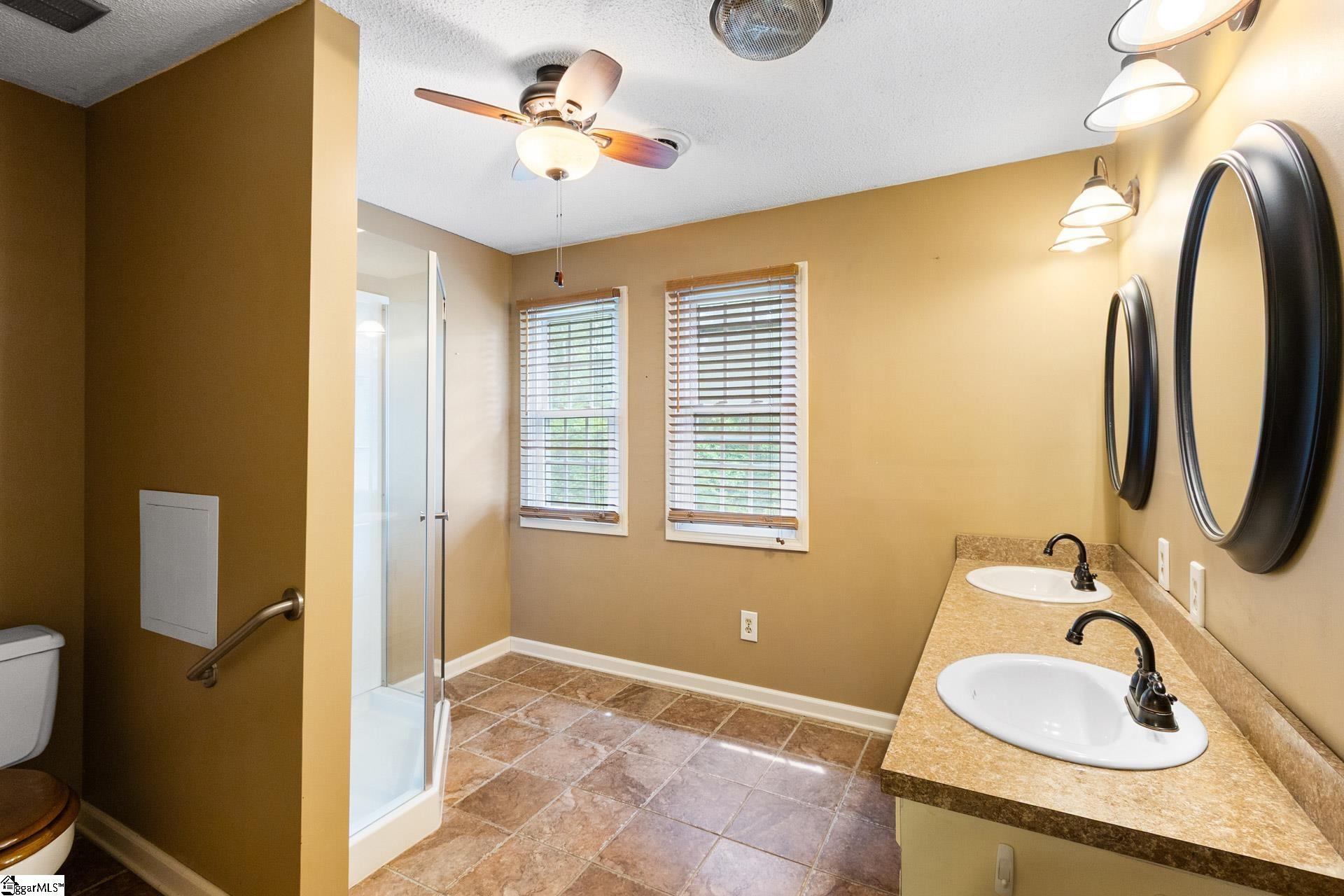 229 Creekfield Road Clinton, SC 29325 - Photo 10 of 23 With Walk-in shower and double vanity