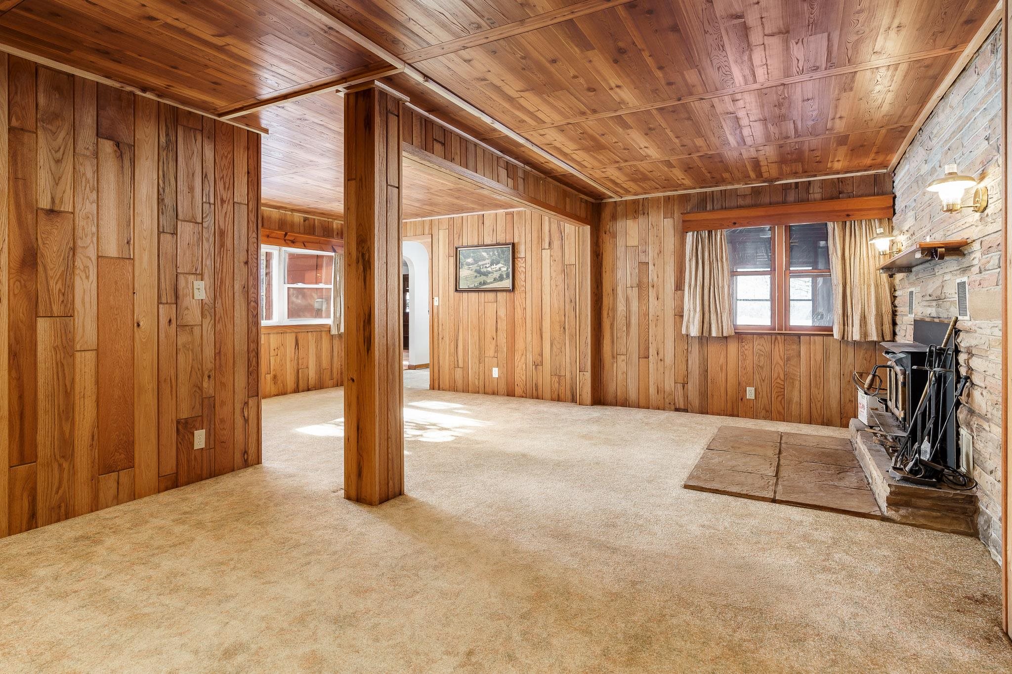 9189 Pomeroy Road Rockton, IL 61072 - Photo 12 of 34 a view of a room with wooden walls and windows