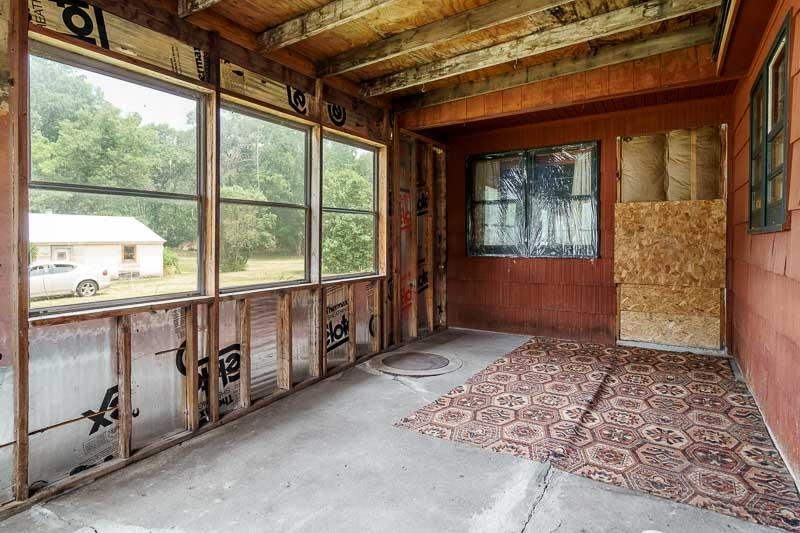 9189 Pomeroy Road Rockton, IL 61072 - Photo 18 of 34 a view of an empty room with windows