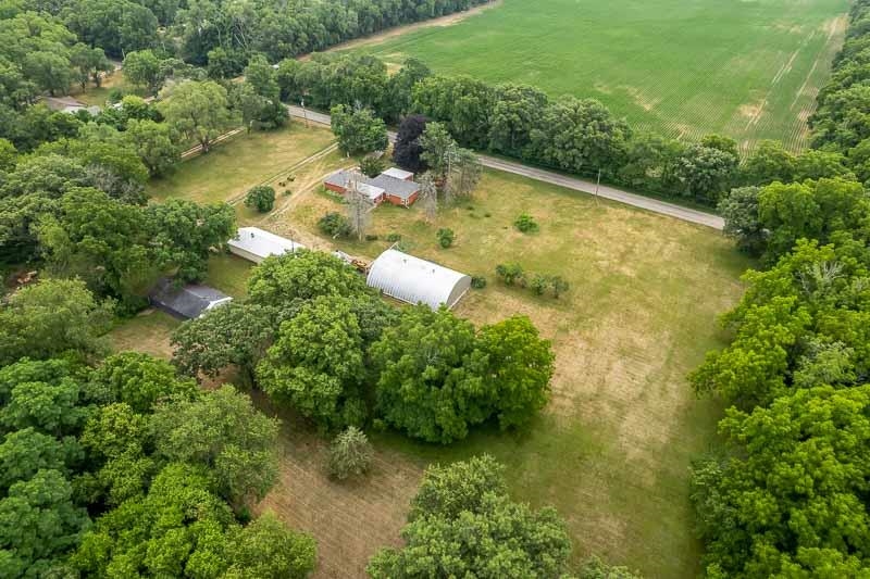 9189 Pomeroy Road Rockton, IL 61072 - Photo 26 of 34 a view of a lake with a yard
