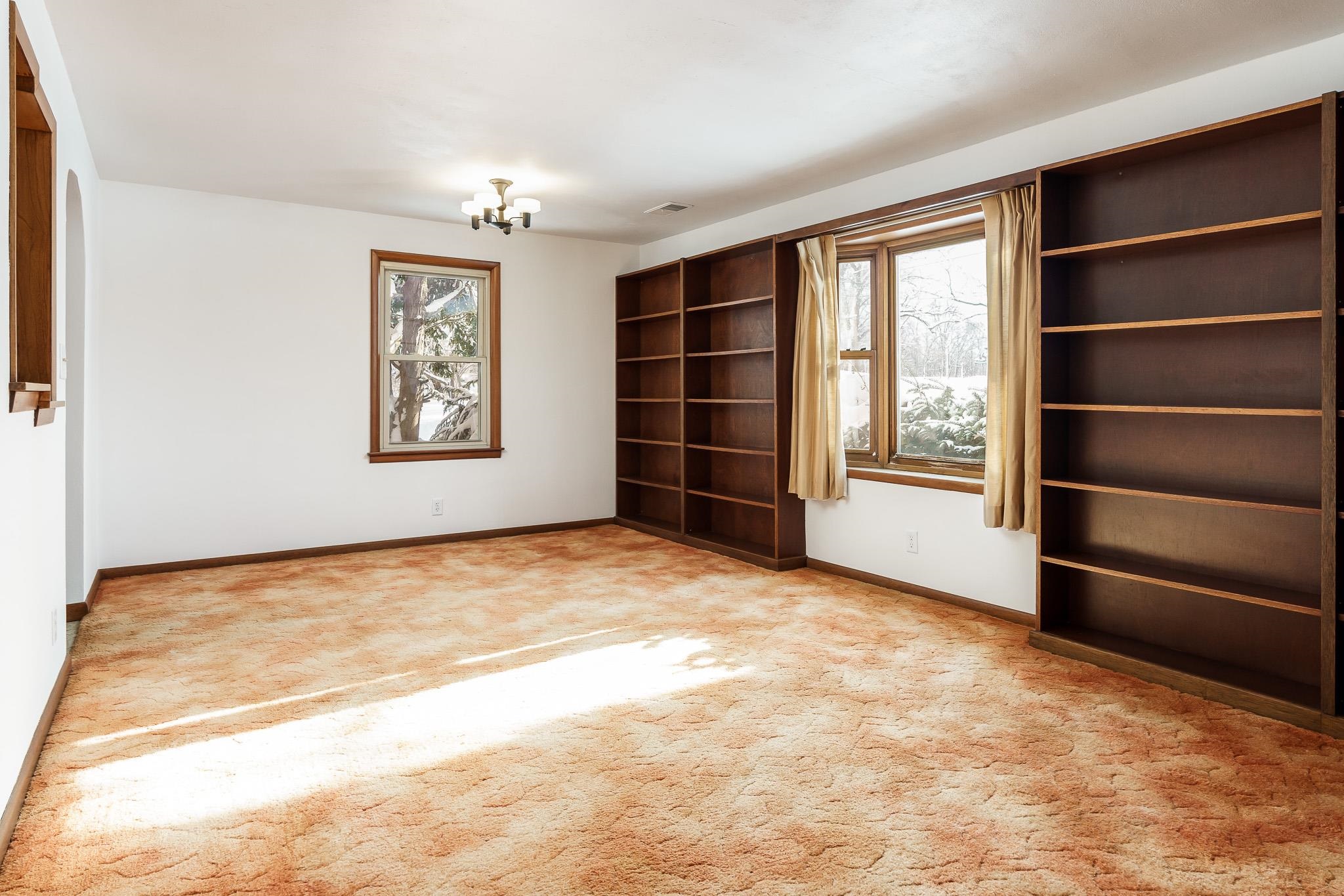 9189 Pomeroy Road Rockton, IL 61072 - Photo 4 of 34 a view of an empty room with a window