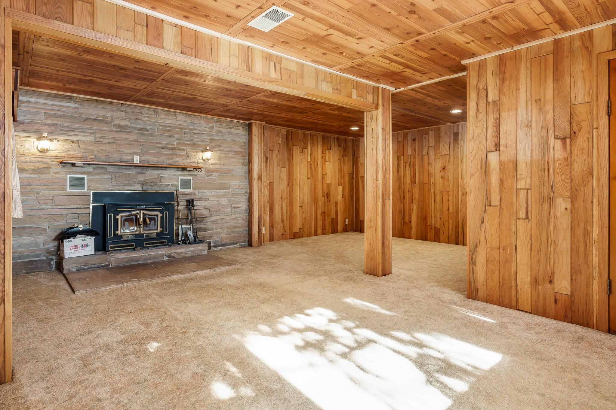 9189 Pomeroy Road Rockton, IL 61072 - Photo 10 of 34 a view of a hallway with wooden walls