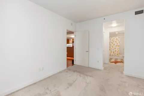 an empty room with an entryway
