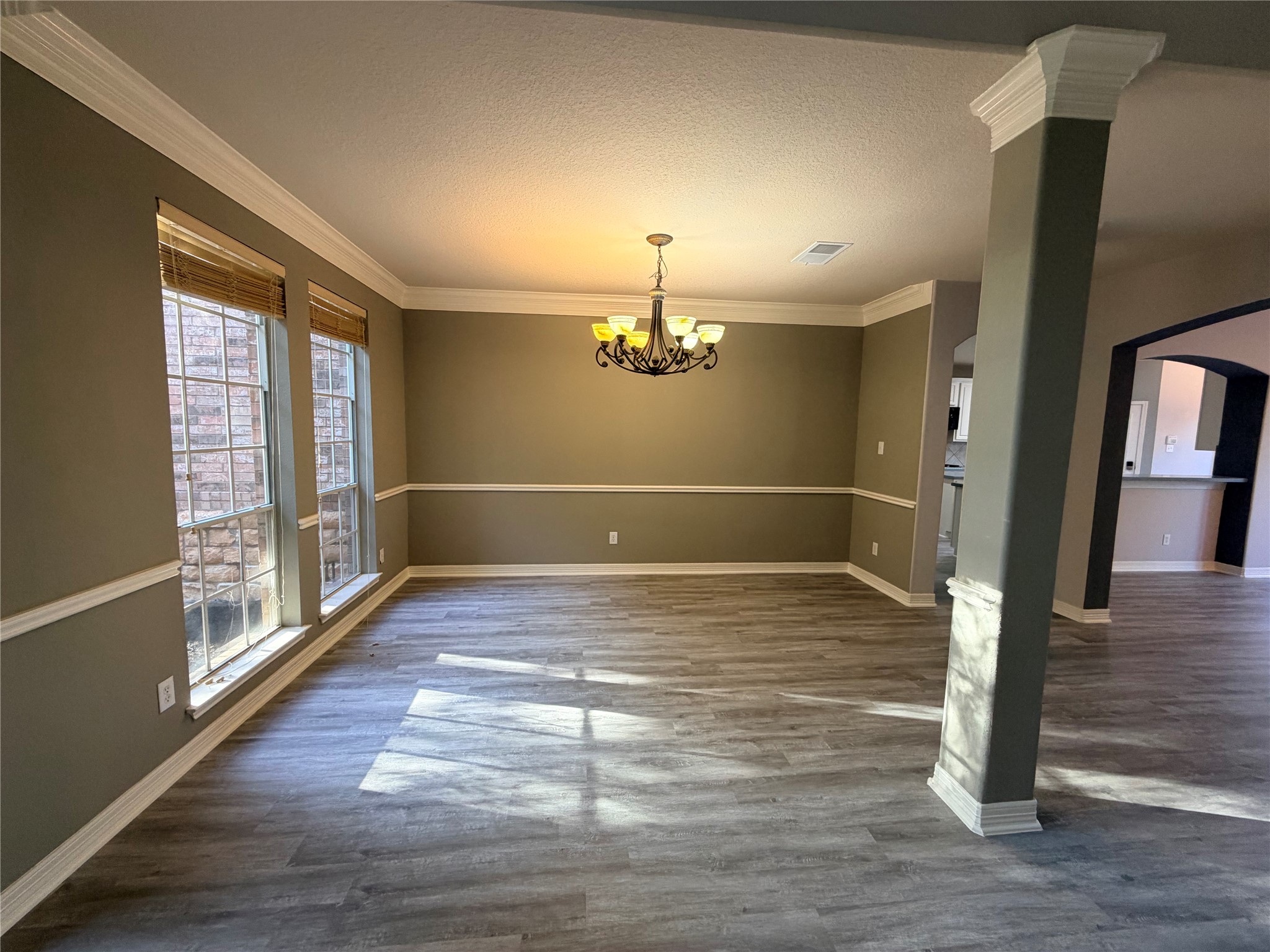 2303 Chelsea Ridge Court Katy, TX 77450 - Photo 12 of 12 a view of empty room with wooden floor and fan