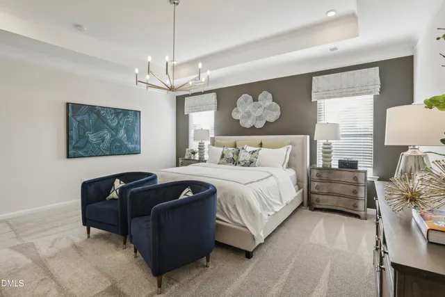 a bedroom with bed and window