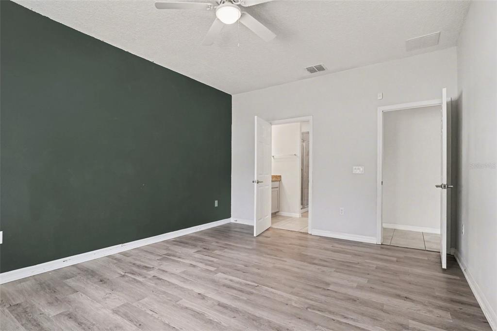 2735 Rowan Street Tavares, FL 32778 - Photo 18 of 32 wooden floor in an empty room