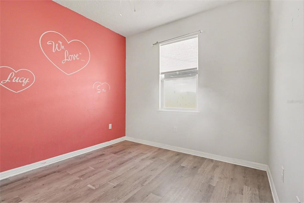 2735 Rowan Street Tavares, FL 32778 - Photo 22 of 32 an empty room with a window