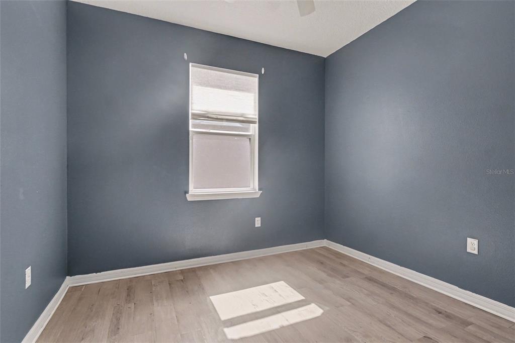 2735 Rowan Street Tavares, FL 32778 - Photo 24 of 32 an empty room with a window