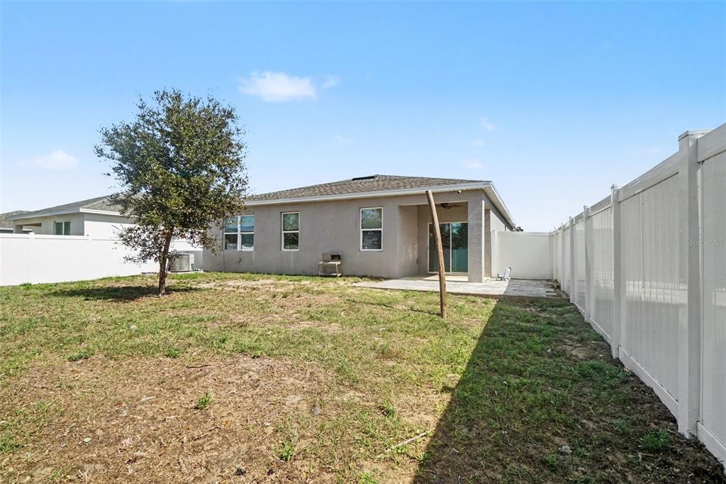 2735 Rowan Street Tavares, FL 32778 - Photo 30 of 32 a front view of house with yard