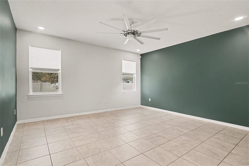 2735 Rowan Street Tavares, FL 32778 - Photo 4 of 32 a view of an empty room with a window